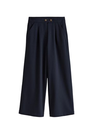 Granatowe spodnie o szerokich nogawkach wykonane z gładkiego materiału, z dwoma przednimi kieszeniami i złotymi guzikami przy talii.