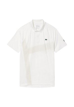 White polo shirt made of fabric, featuring a subtle beige diagonal pattern, green logo on the left chest, and branded accent on the sleeve.