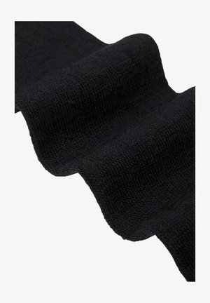 Sort strikket stof med en tekstureret overflade, der viser bløde bølger og kanter. Har et let, elastisk design til alsidig brug.