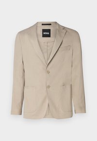 Blazer leggero beige con chiusura a un bottone, due tasche frontali, revers a punta e una texture liscia. Etichetta del marchio "BOSS" all'interno.