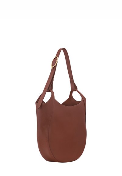 Brown leather tote bag with a smooth texture, curved shape, dual handle openings, and a gold accent on the strap.
