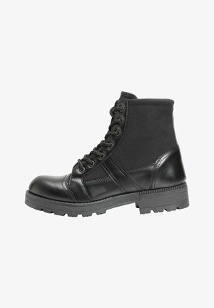 Stivaletti con plateau - black