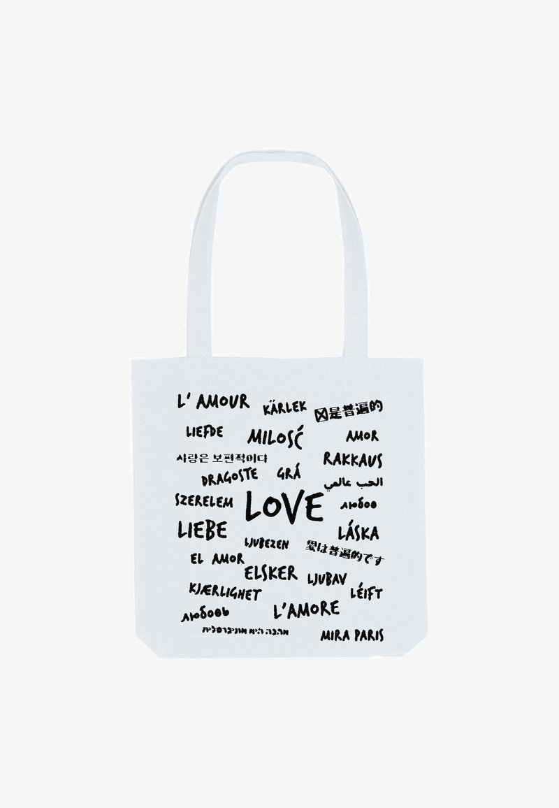 Witte canvas totebag met verschillende vertalingen van "liefde" in zwarte typografie, met het woord "LIEFDE" opvallend weergegeven in een groter lettertype.
