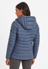 Padded navy blue jacket with a hood, featuring horizontal quilted detailing and a logo accent on the left sleeve. Smooth texture.