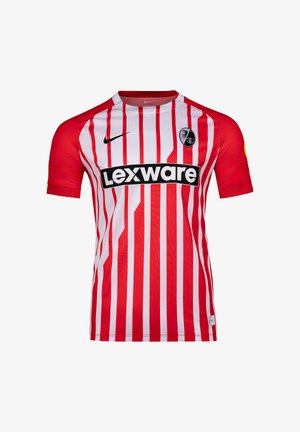 Maillot de football à rayures verticales rouges et blanches avec manches rouges, logo Nike noir, texte du sponsor Lexware et blason du club SC Freiburg sur la poitrine.
