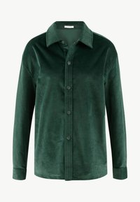 Groene corduroy shirt met een knoopsluiting aan de voorkant, spitse kraag en lange mouwen. De stof heeft een zachte, gestructureerde afwerking.