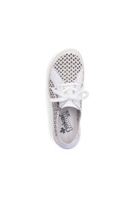 White lace-up shoe with a mesh upper, textured design, and a rubber sole. Features a padded collar and logo detailing inside.