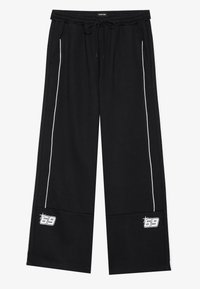 UNISEX - Tracksuit bottoms - black/white