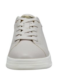 Light gray sneaker with a smooth leather upper, textured sole, white rubber midsole, and flat lace design. Gold accents at the tongue.