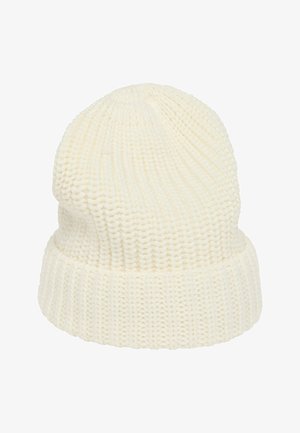 Berretto lavorato a maglia crema con una texture a costine e una vestibilità aderente. La parte superiore è leggermente conica e presenta un bordo piegato alla base.