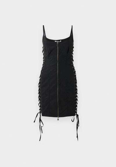 Black dress with a zip front, spaghetti straps, and lace-up sides featuring long ties. Made from a smooth, lightweight fabric.