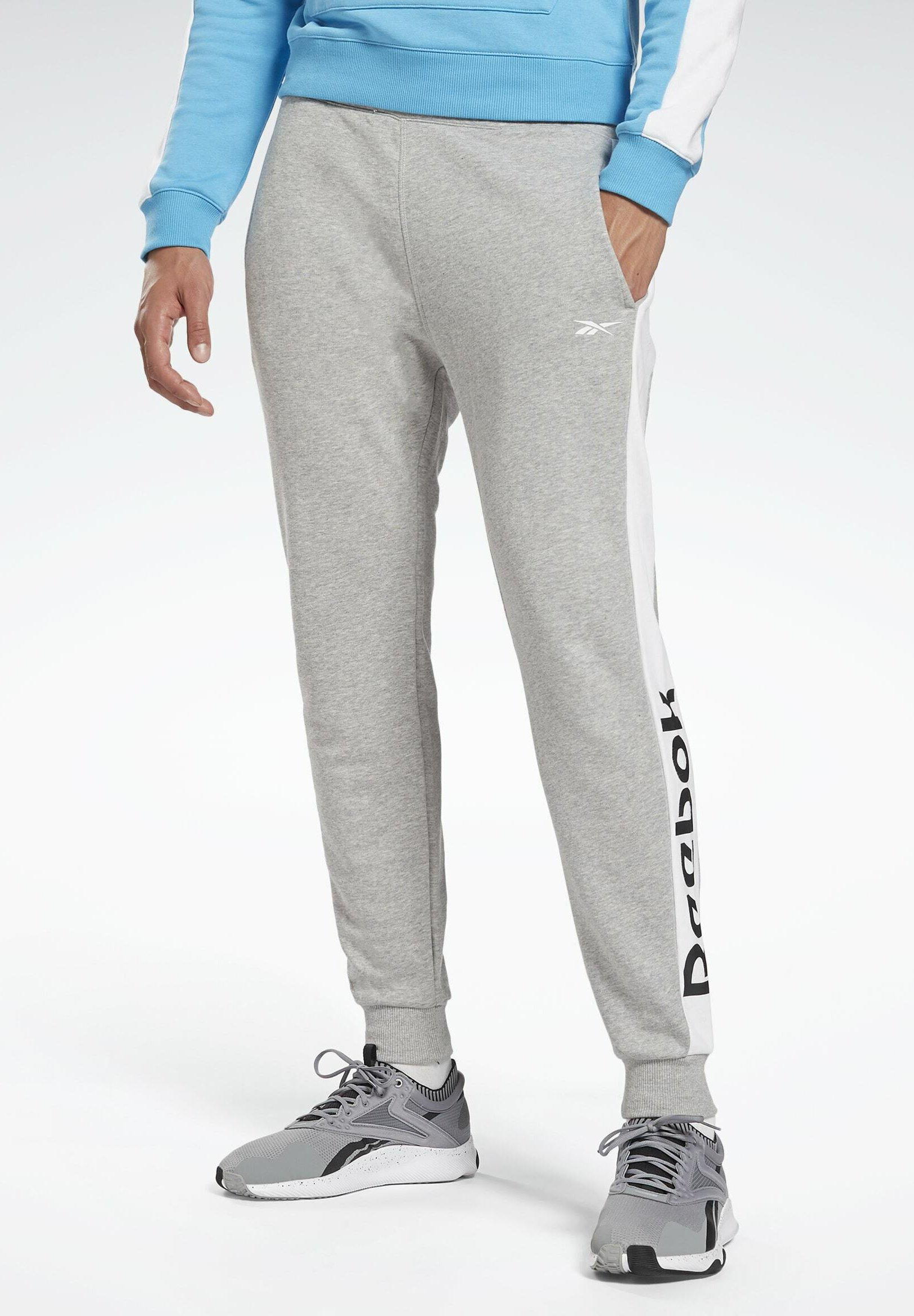 spodnie training essentials logo