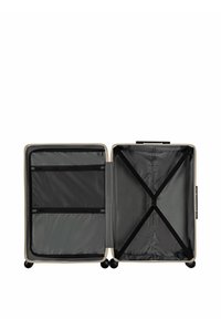 Harde koffer met een beige buitenkant. Het interieur is voorzien van grijze stofbekleding, ritsvakjes en elastische kruisbanden om items te bevestigen.