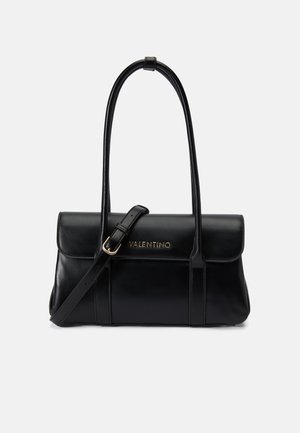 Black leather handbag with a structured design, featuring a top flap, two long handles, a detachable strap, and gold logo detailing.