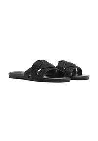 Sandalias de slide negras con correas cruzadas de textura, hechas de un material trenzado, que cuentan con una suela plana y un diseño minimalista.