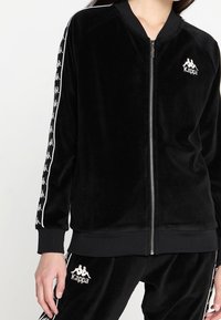 Kappa Felpa con zip - black