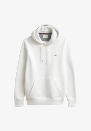 Hvid hættetrøje med frontlomme, justerbar snøre i hætten og et lille logo. Fremstillet af blødt stof med ribstrikkede manchetter og kant.