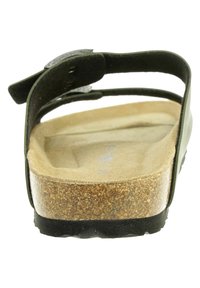 Sandali neri sintetici con plantare in sughero, cinturino regolabile e suola texture. Il design presenta una costruzione minimalista e aperta sulla punta.