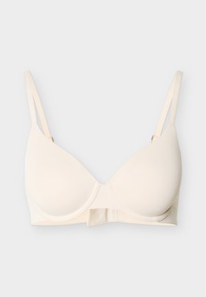 Μπεζ μπραζιέρ με μπανέλα και διαμορφωμένα cups, με ρυθμιζόμενα διπλά ράντες σε απλό ανοιχτό φόντο.