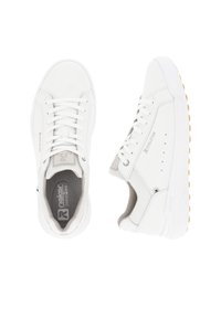 White athletic sneakers with a smooth leather upper, flat laces, and rubber sole. Features perforated accents and a cushioned interior.