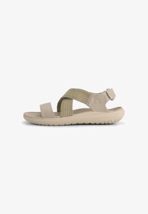 Beige casual sandaal met dikke stoffen gekruiste bandjes, verstelbare hielband en een textuurlzool geschikt voor buitengebruik.
