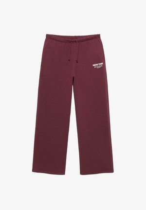 Pantaloni sportivi bordeaux in cotone, con vita regolabile e logo stampato "NEW YORK BIG CITY BLUES" in bianco sull'anca sinistra.
