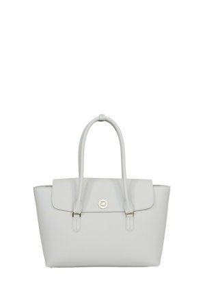 Sac à main en cuir blanc avec deux poignées, fermeture à rabat, et petit emblème rond en argent au centre avant.