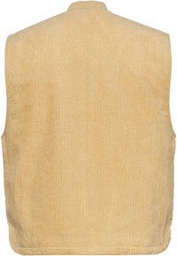Gilet en velours côtelé beige avec texture à côtes verticales, sans manches et col rond. Le dos est uni sans attaches ou poches visibles.