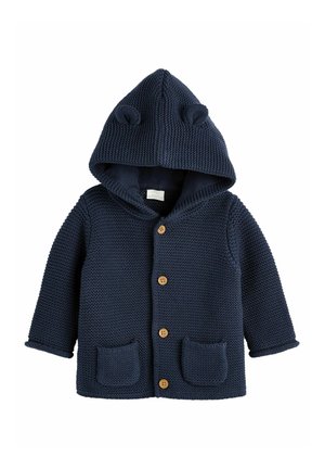 Cardigan bébé tricoté bleu marine avec capuche, petites oreilles d’ours, boutons en bois sur le devant et deux poches devant.