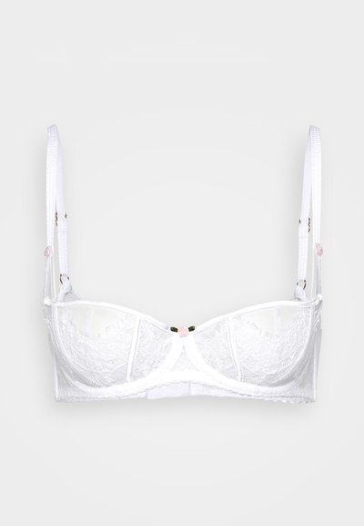Witte kanten bh met beugel, met verstelbare schouderbanden en een klein roze bloemenaccent in het midden. Golfachtige randen en gaasdetails.
