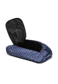 Navy fabric bag with a floral pattern features a wide opening, smooth texture, and a black interior. Closed zipper along the top.