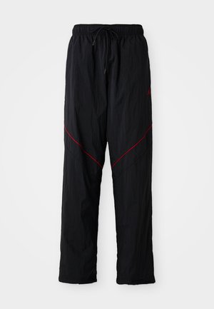 Jordan DRAFT PANT - Pantalon de survêtement - black/gym red