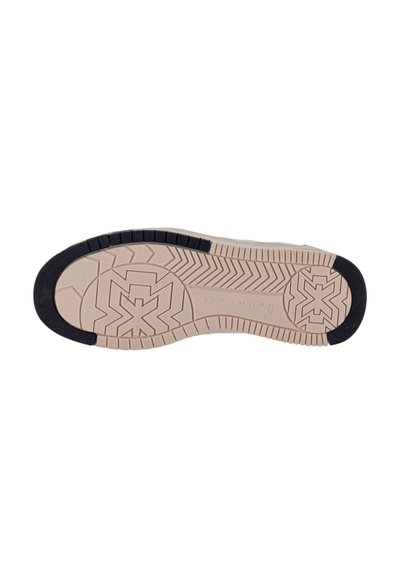 Suola della scarpa con una base in gomma beige, tacco e punte neri, caratterizzata da un motivo di battistrada testurizzato per aderenza e stabilità.