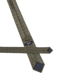 Cravate verte avec un motif paisley blanc et marine répétitif. Présente un revers uni marine et une étiquette avec "JOOP!" en texte blanc.