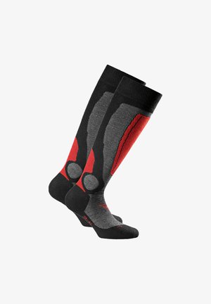 Schwarz-graue knielange Socken mit roten Akzenten, die ein strukturiertes Design und verstärkte Bereiche an Ferse und Zehen aufweisen.