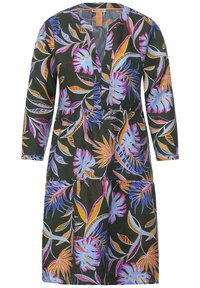 Zielona sukienka z tropikalnym wzorem liści w odcieniach różu, niebieskiego i pomarańczowego. Posiada długie rękawy i dekolt w kształcie litery V. Luźny fason.
