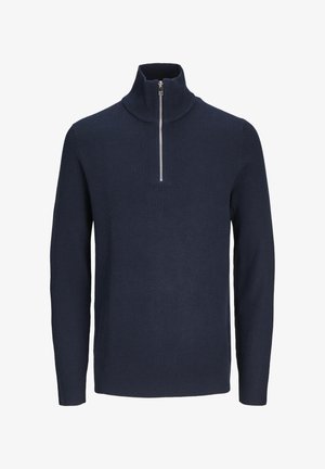 Mørkeblå ribbestrikket genser med høy krage og halv glidelås foran. Lange ermer med tettsittende mansjetter. Myk tekstur.