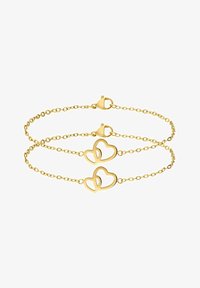 Geselecteerd, gold-coloured