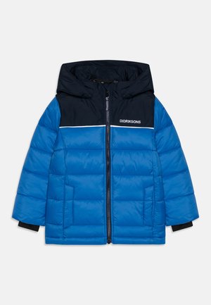 Blue padded jacket with a dark blue hood and yoke. Features a white horizontal stripe and zip closure. Pockets on both sides.