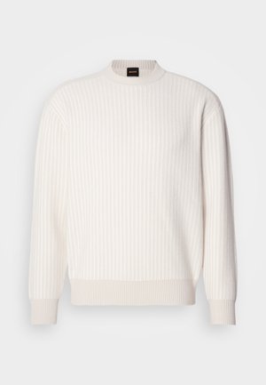 White ribbed sweater with a round neckline and long sleeves. Features a textured fabric with a soft finish and subtle horizontal lines.