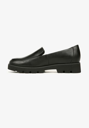 Black leather slip-on shoes with a rounded toe, low-profile design, and a thick, textured rubber sole.