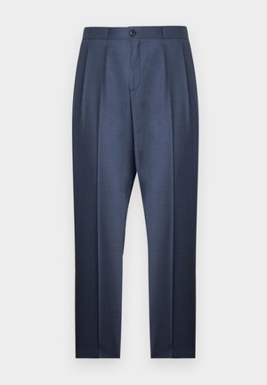 Tumesinised meeste ülikonnapüksid esikortsude, nööpidega vöökohaga ja kitsenevate säärega valgel taustal.