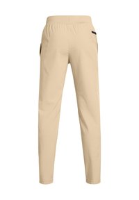 Beige rekbroeken met een elastische tailleband, taps toelopende benen, zijzakken en een zwarte accent op de achterkant van de broekzak. Glad, lichtgewicht stof.