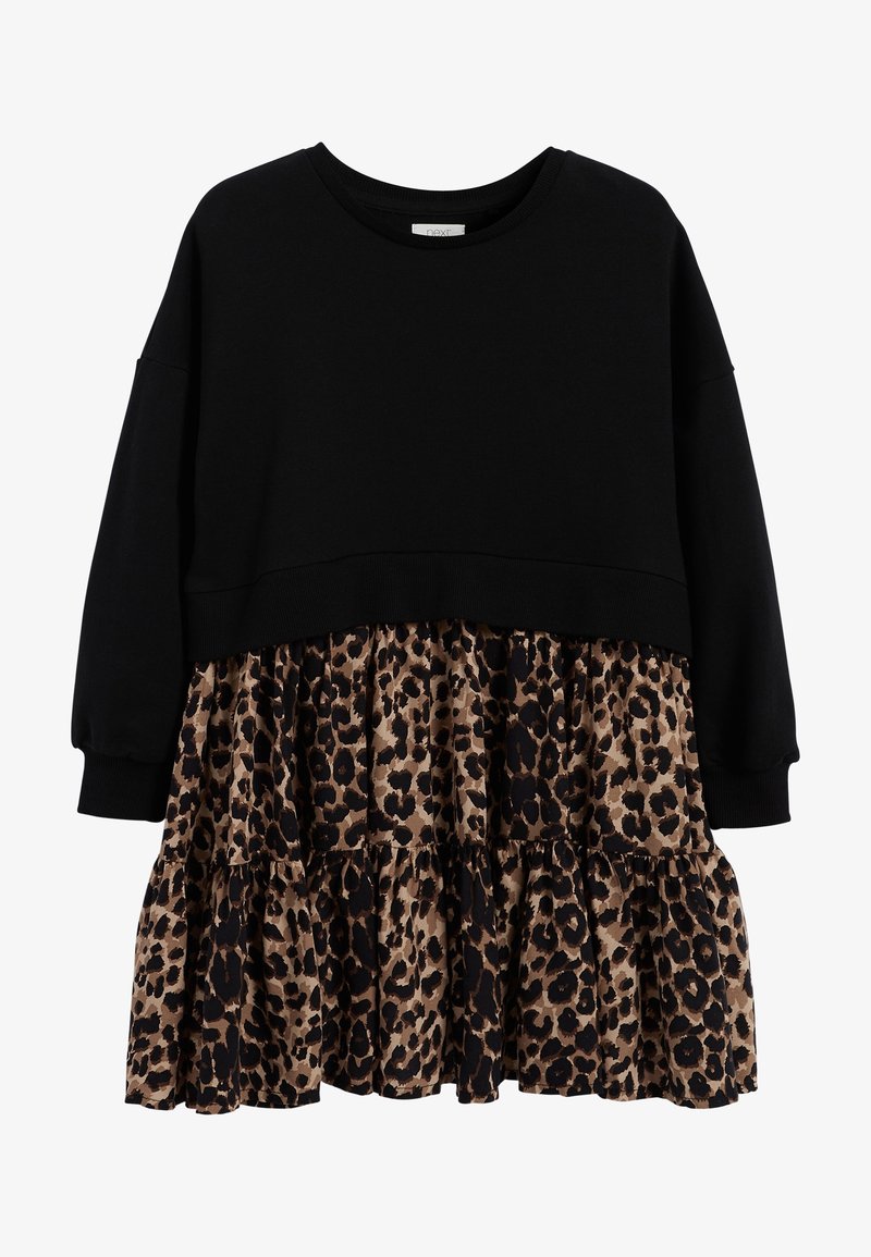 Robe à manches longues avec un haut noir uni et une jupe évasée à volants, ornée d’un motif léopard marron et noir.
