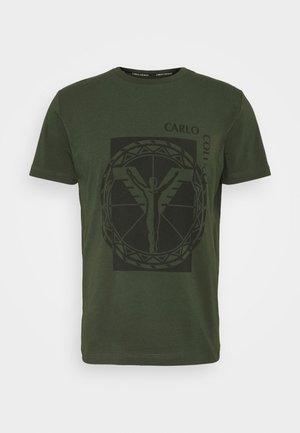 Olive green cotton t-shirt featuring a large black graphic print of a stylized figure within a circular design and the text "CARLO COLUCCI."