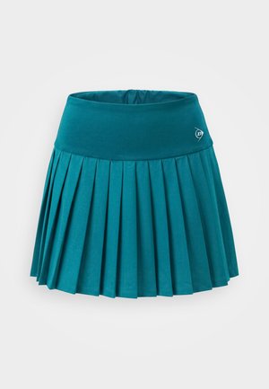 Turquoise geplooide tennisrok met brede tailleband en klein wit logo aan de rechterkant, afgebeeld op een effen achtergrond.