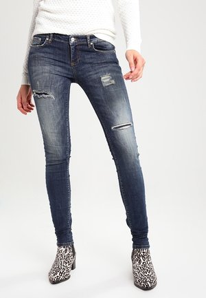 Jean slim - destroyed denim