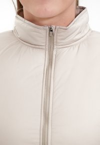 Endurance Veste sans manches - 1136 simply taupe