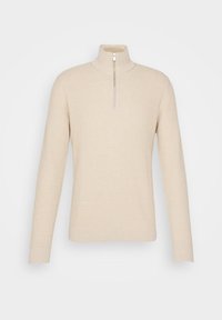 Beige ribbstickad tröja med hög krage och kort dragkedja. Har långa ärmar och en figursydd design för en strömlinjeformad look.