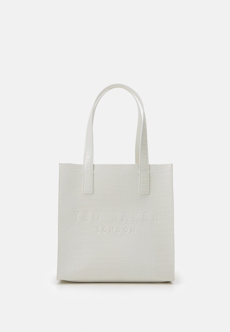 Hvit faux lær tote bag med krokodillestruktur, preget "TED BAKER LONDON"-logo foran, med to flate håndtak.